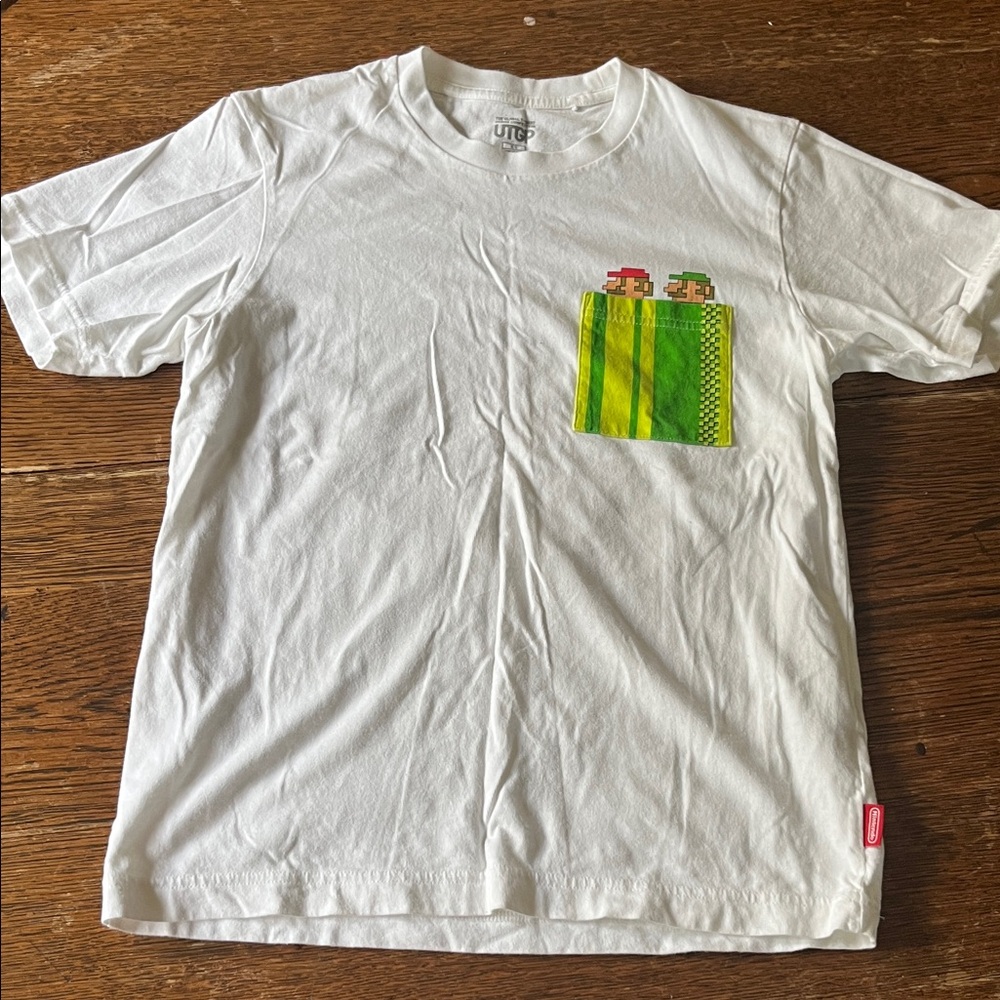 Uniqlo White T-Shirt with Green and Yellow Pixel Pocket Graphic